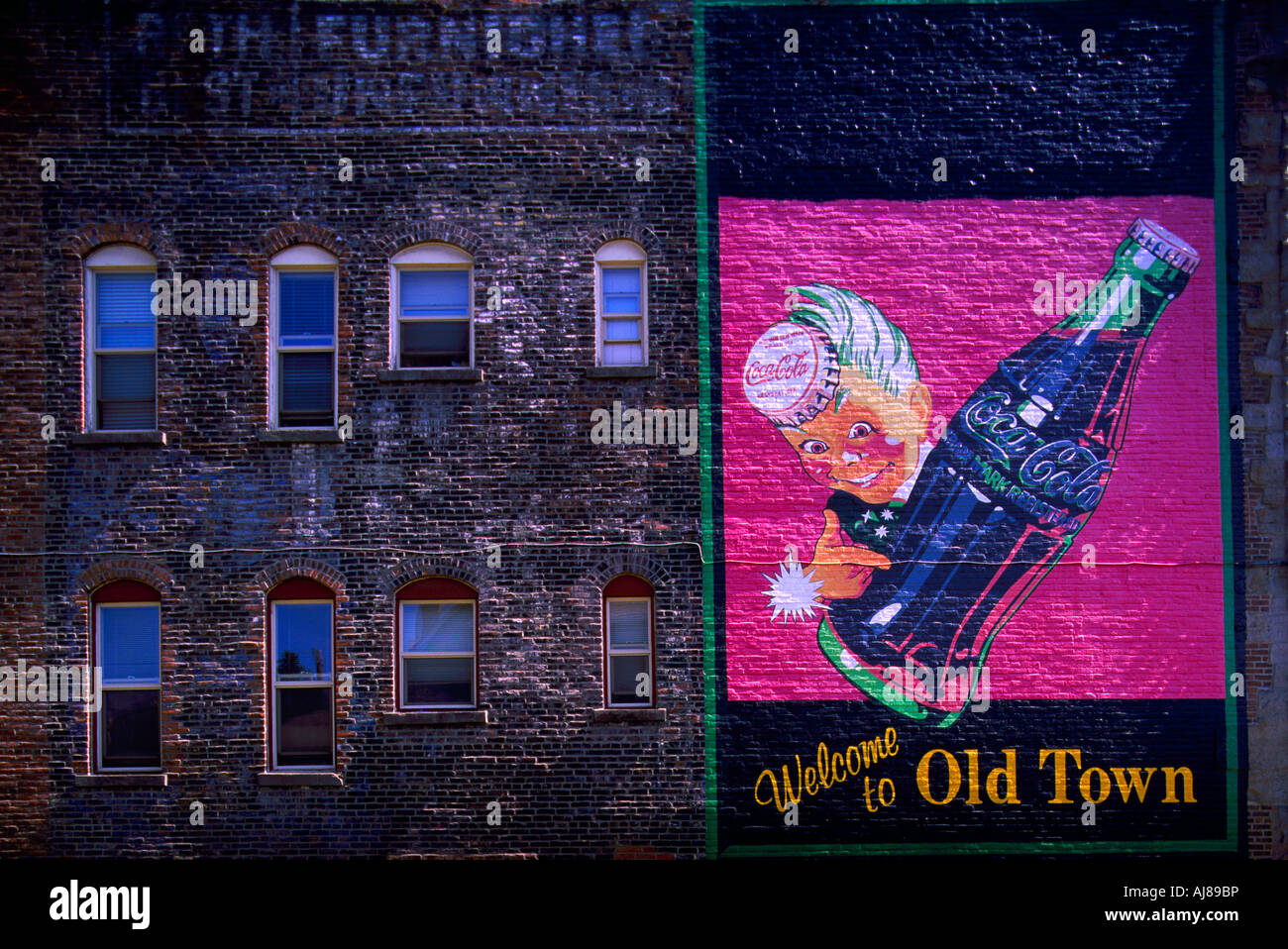 Coca Cola Advertising on Old Brick Building Facade, Old Town Bellingham, Washington, USA Stock Photo