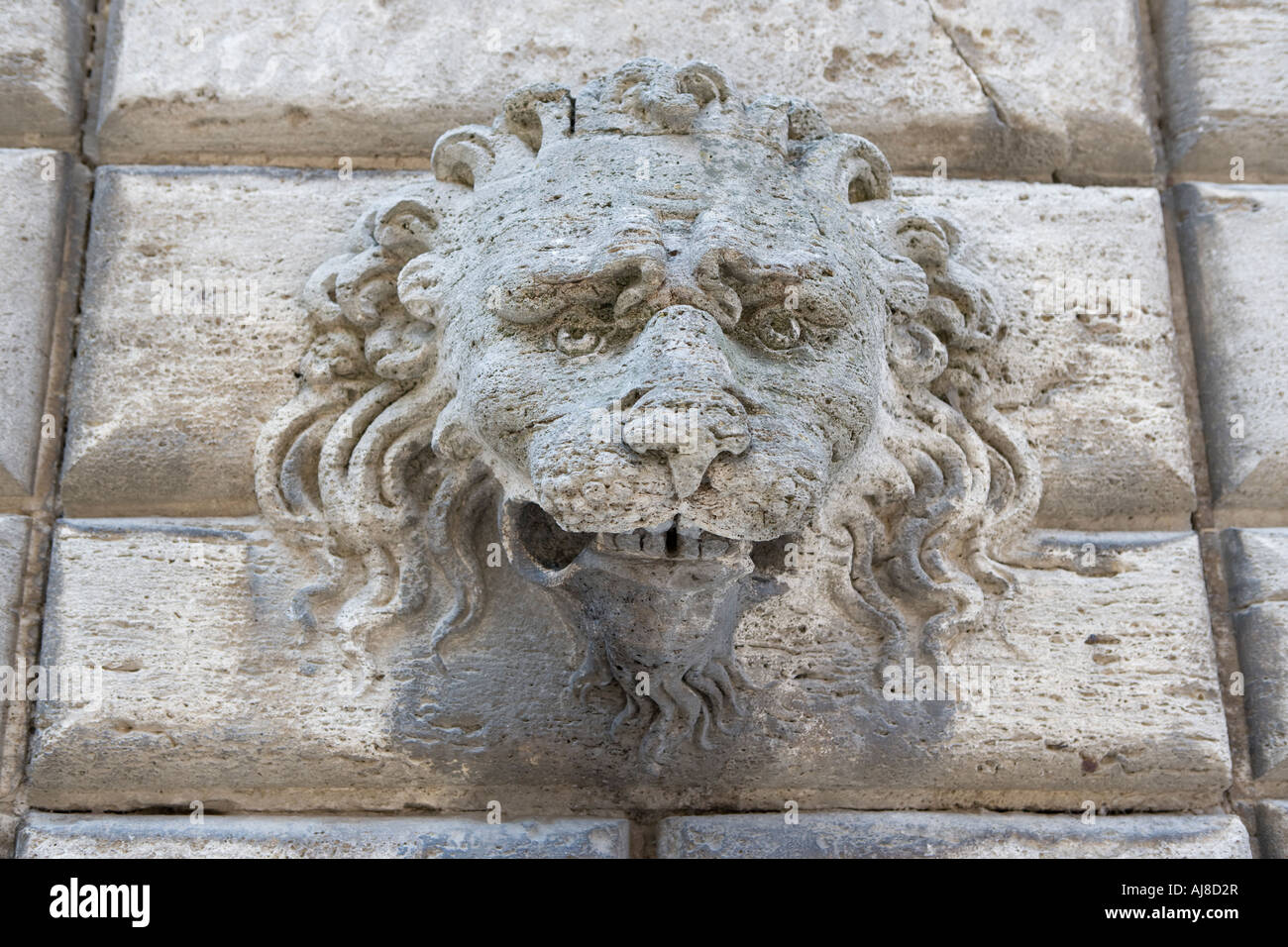 Carved stone lions head Montepulciano Tuscany Italy Stock Photo