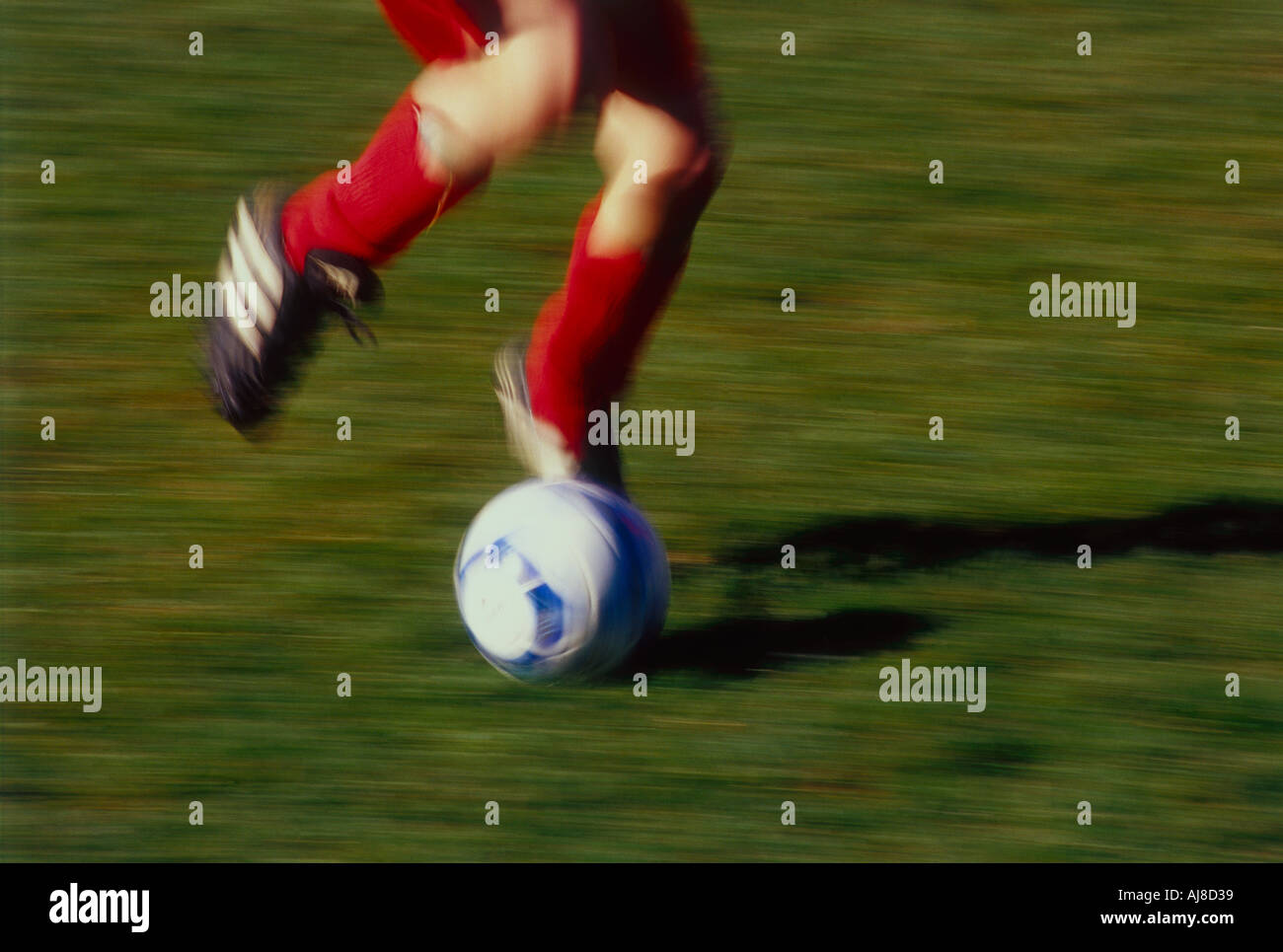 Soccer ball being kicked Stock Photo Alamy