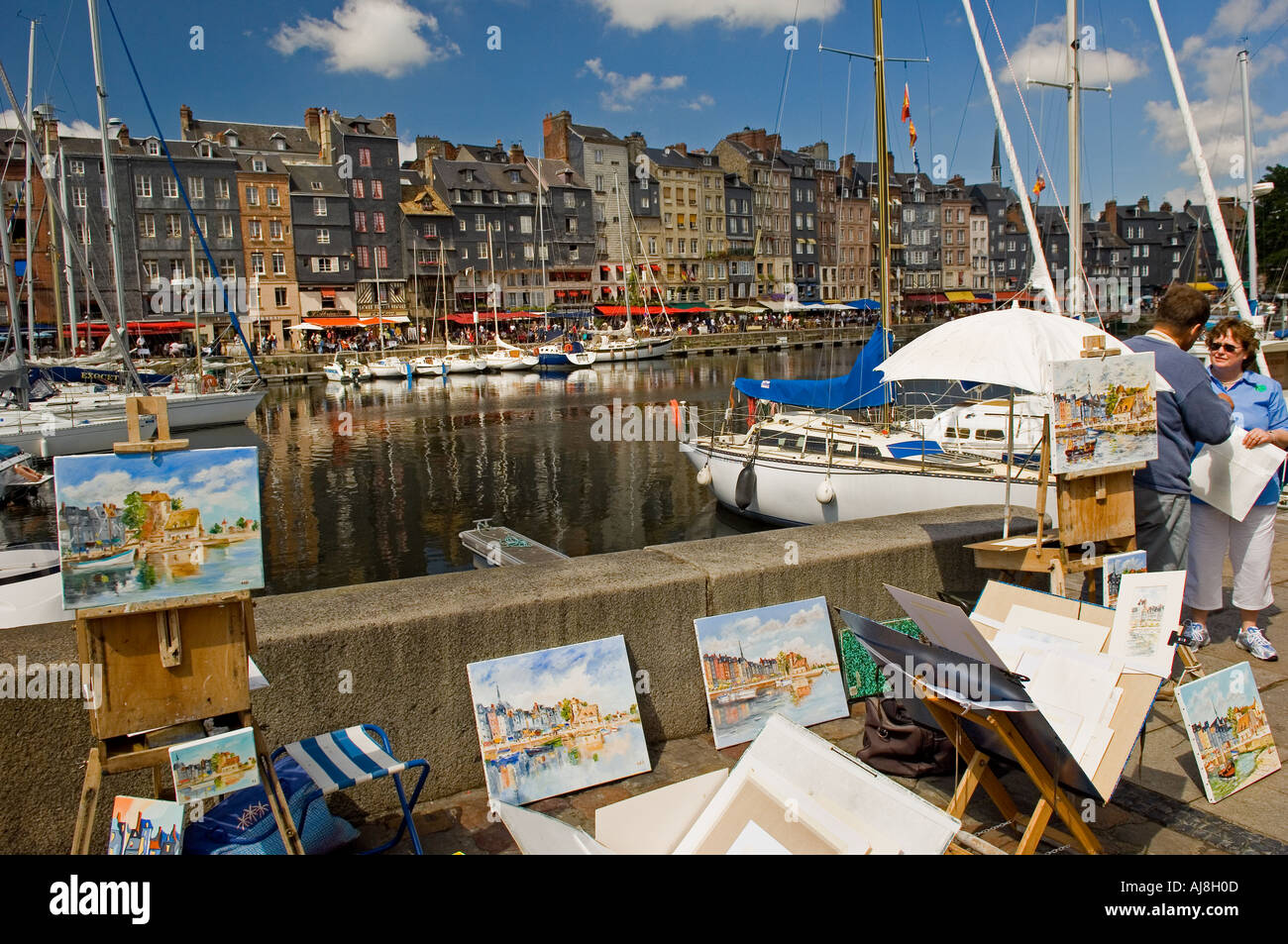 Honfleur artists work on display at the old Vieux Bassin in Normandy