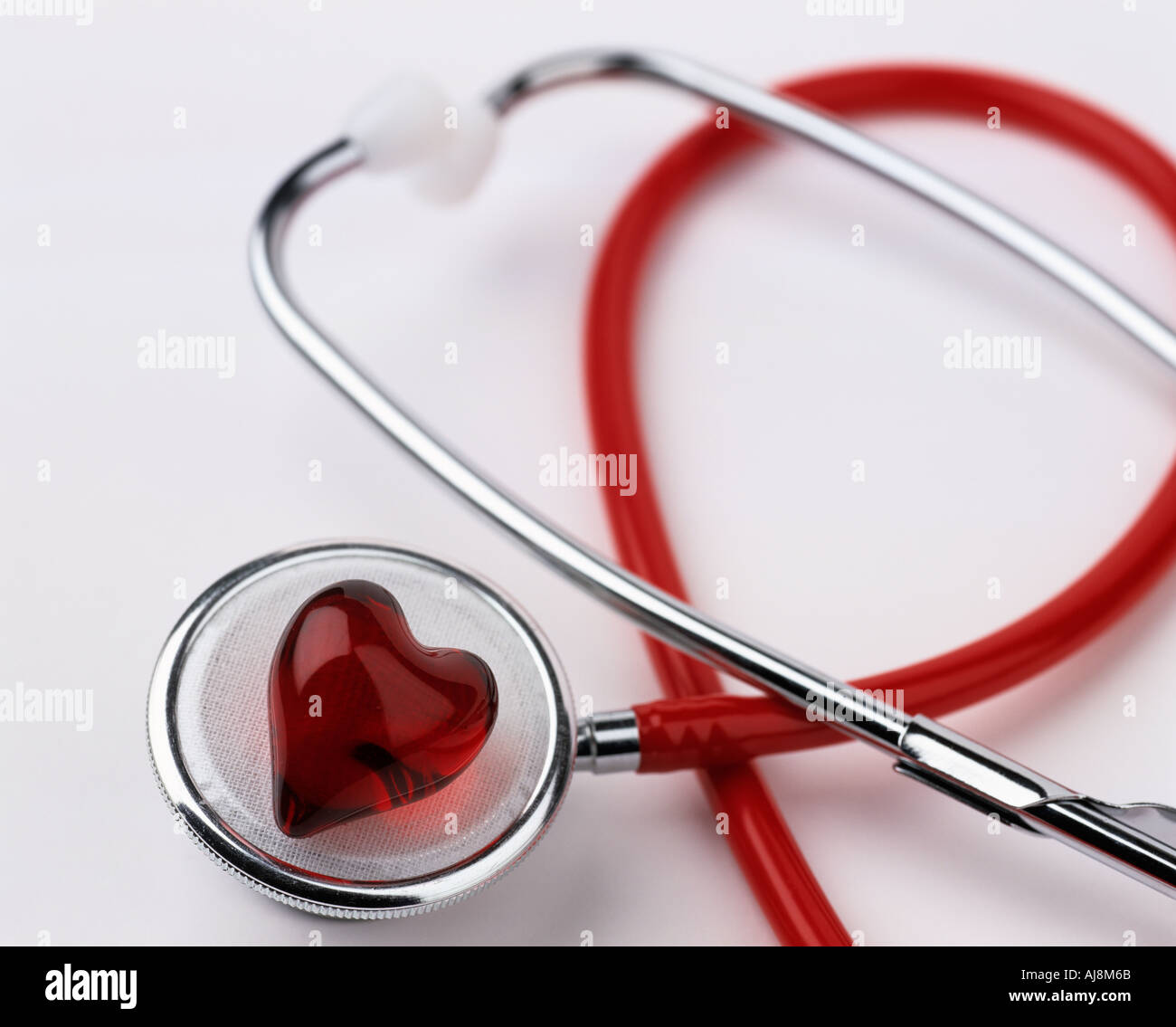 RED MEDICAL STETHOSCOPE WITH A RED HEART SYMBOL Stock Photo - Alamy