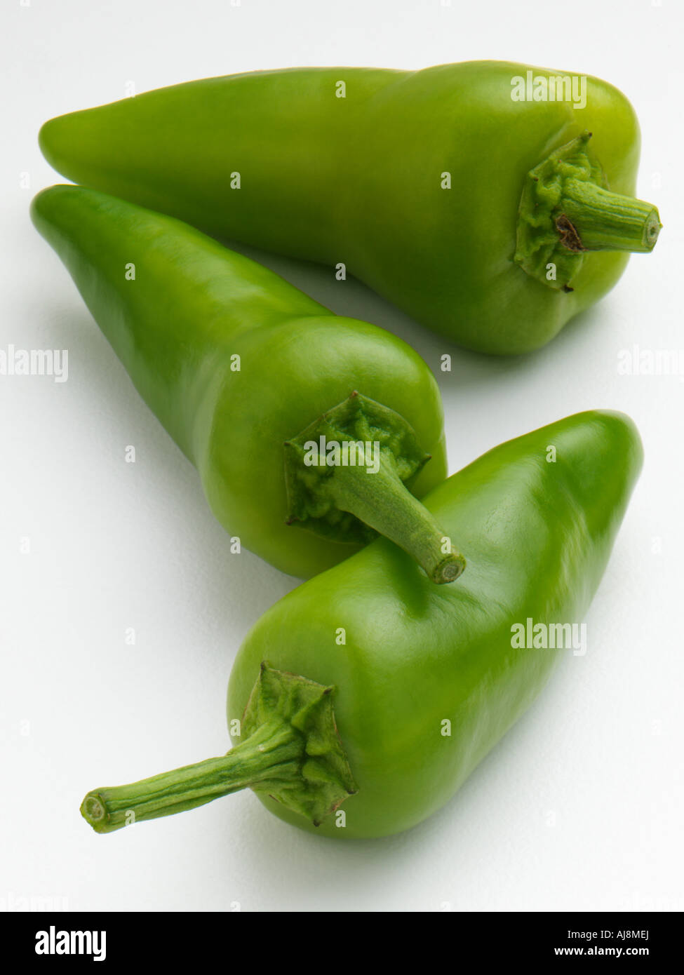 Green chiles on a white background Stock Photo