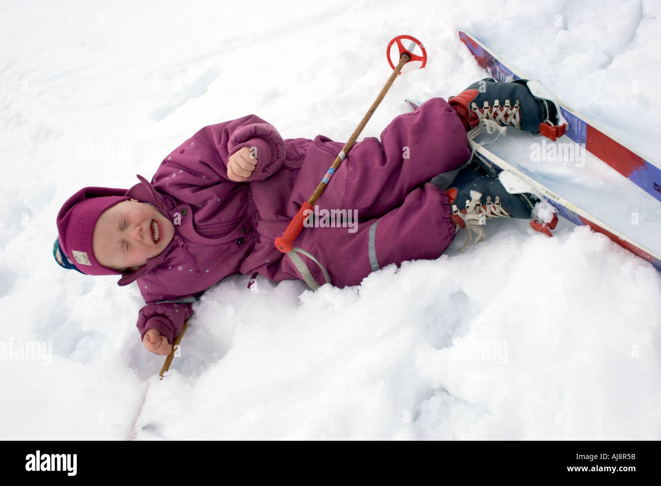 Girl three years old learning to ski Stock Photo Alamy