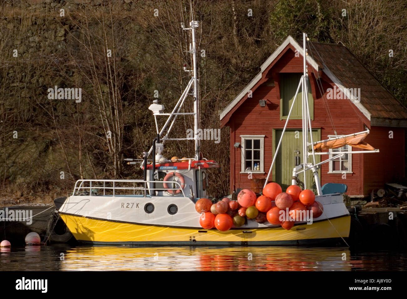 Local fishing boat in the port of Kopervik, Karmoey, Norway. Stock Photo