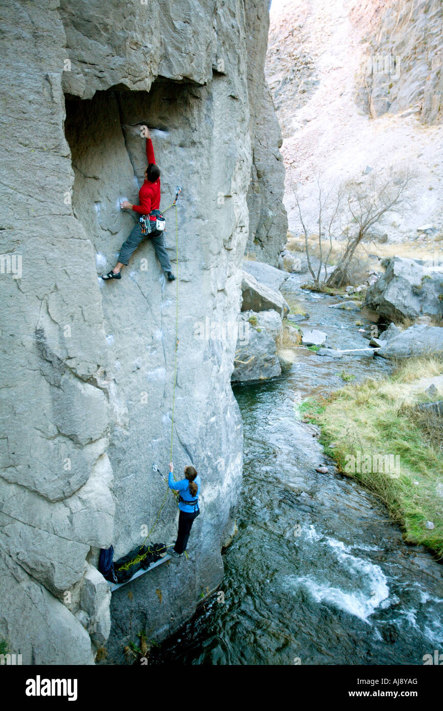 Climbing/belaying above a river Stock Photo Alamy