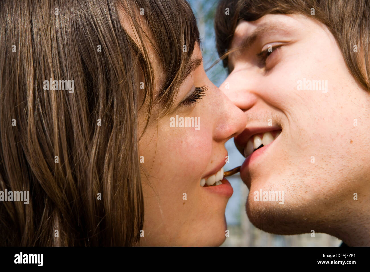 Young couple preparing to kiss Stock Photo