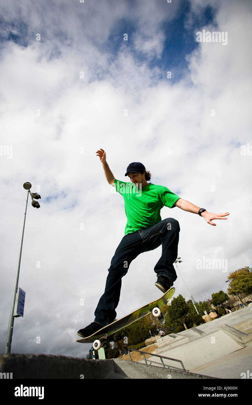 A skateboarder does a trick in mid air Stock Photo Alamy