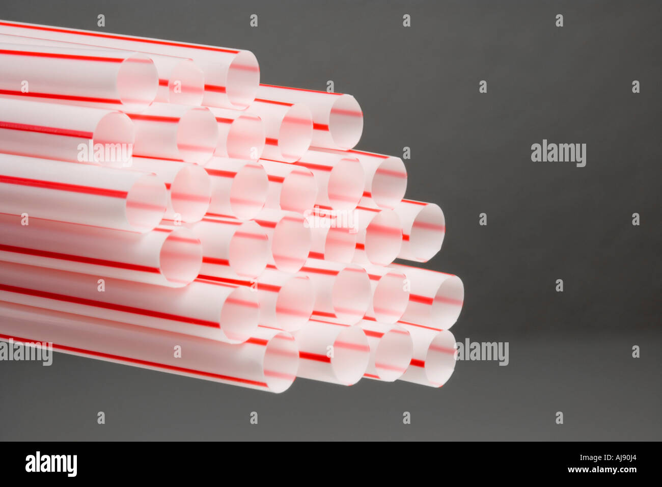 Bunch of red drinking straws hi-res stock photography and images - Alamy