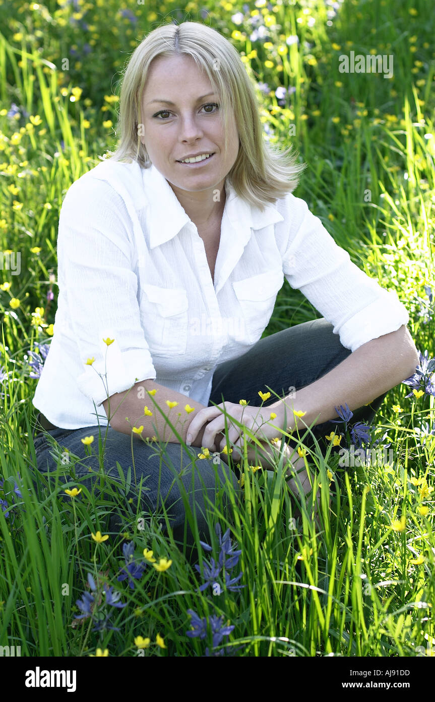 Slim blonde woman clothed hi-res stock photography and images - Alamy