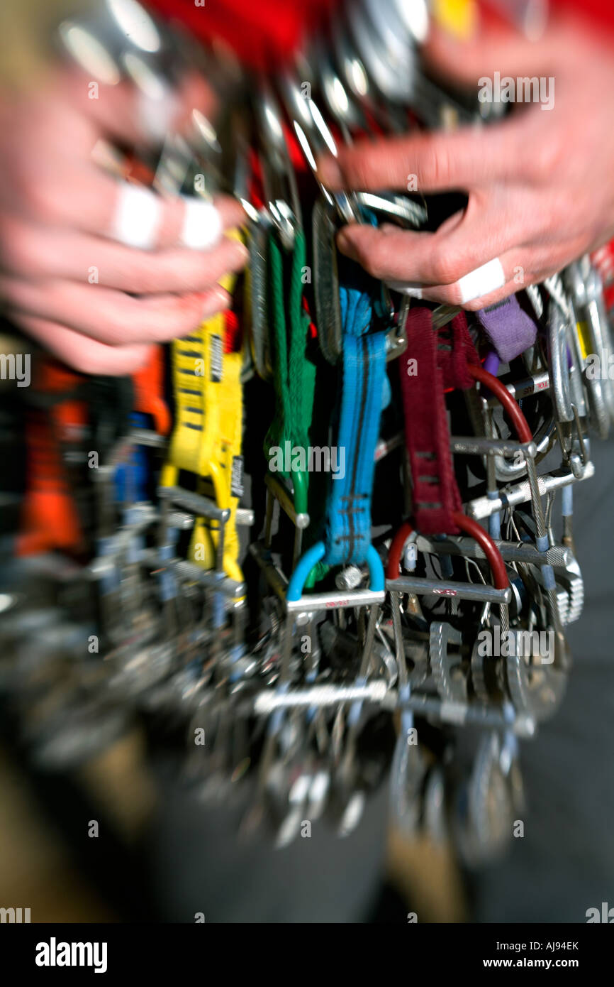 Hands holding a rack of cams Stock Photo - Alamy