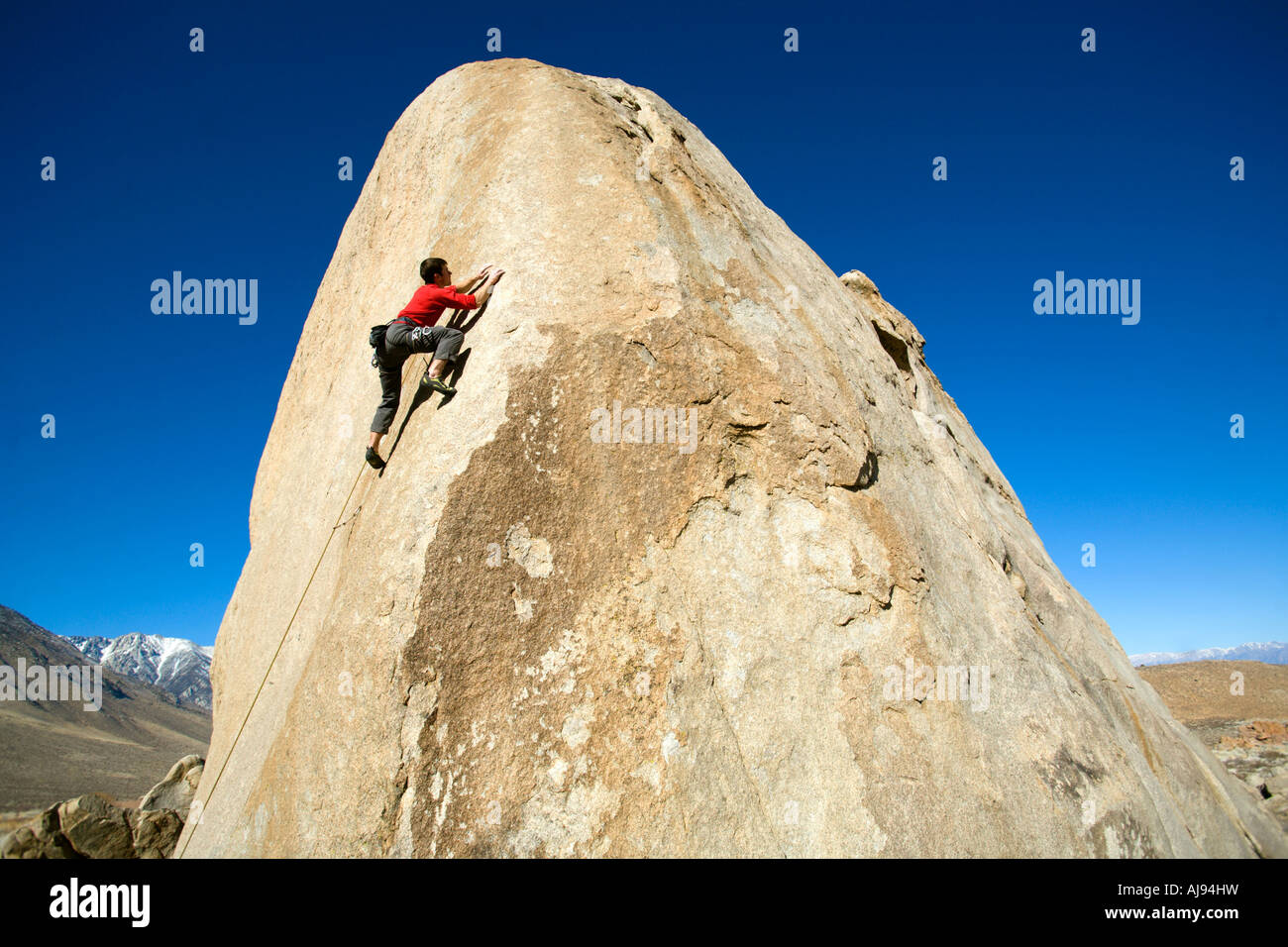 Male lead climbing on a boulder Stock Photo Alamy