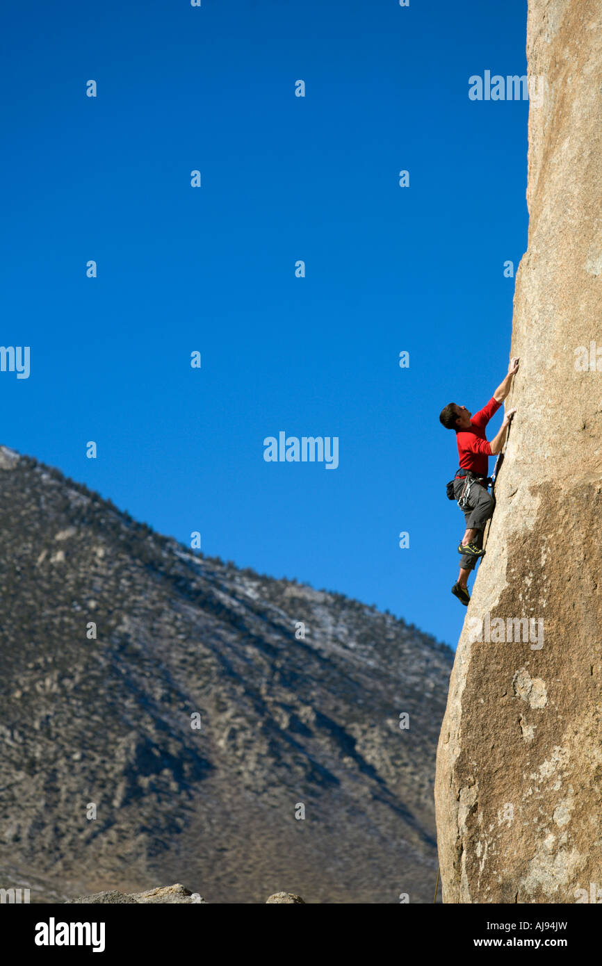 Male lead climbing on a boulder Stock Photo Alamy