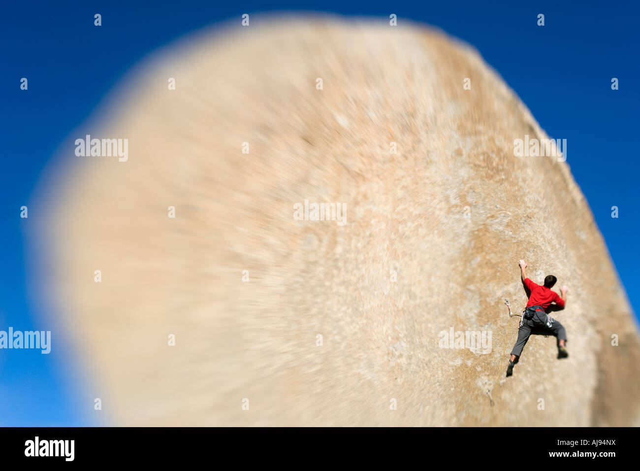 Male lead climbing on a boulder Stock Photo Alamy
