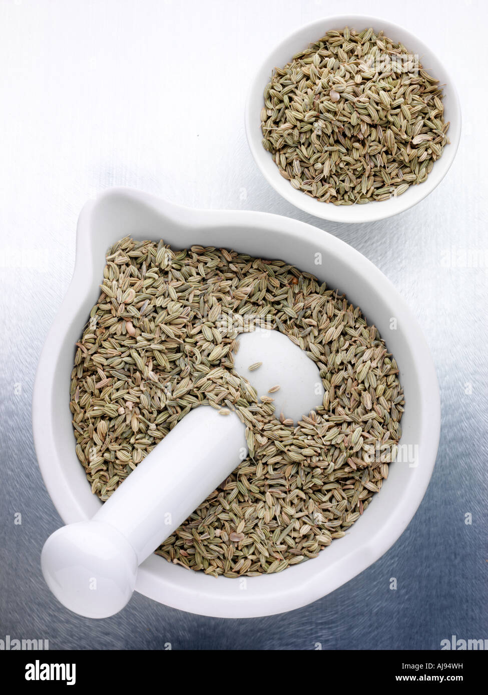 FENNEL SEEDS IN PESTLE AND MORTAR Stock Photo Alamy