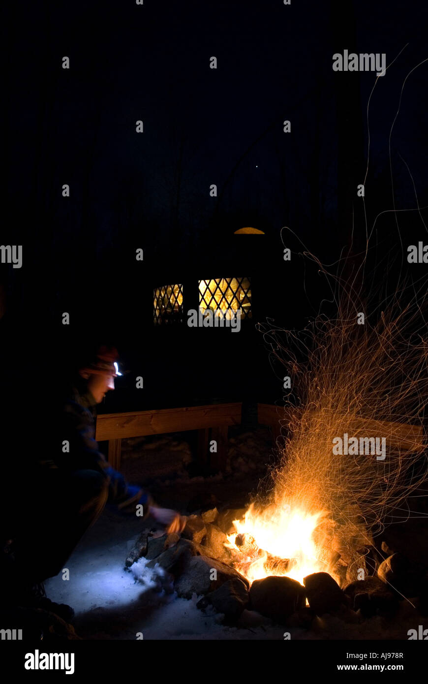 Man stoking fire hires stock photography and images Alamy