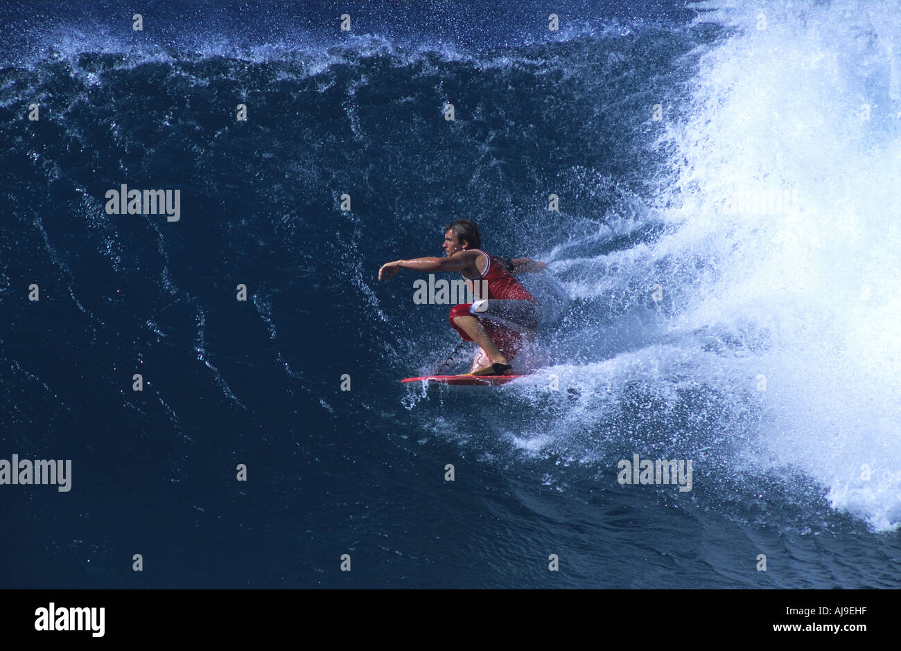 Body boarder rides wave on the north shore of Oahu Hawaii Stock Photo