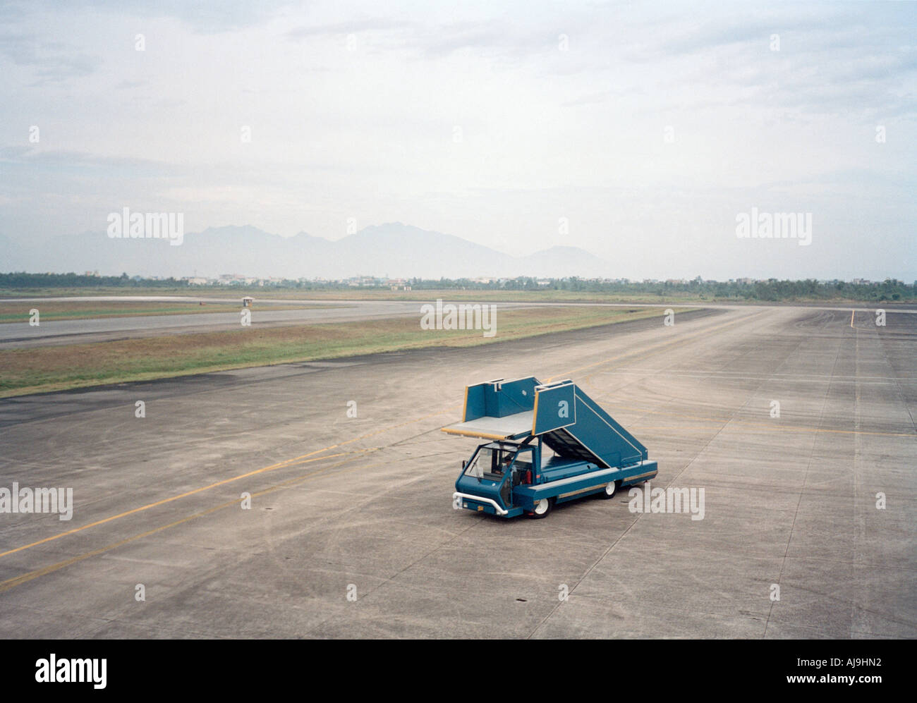 Boarding vehicle on airport runway Stock Photo Alamy