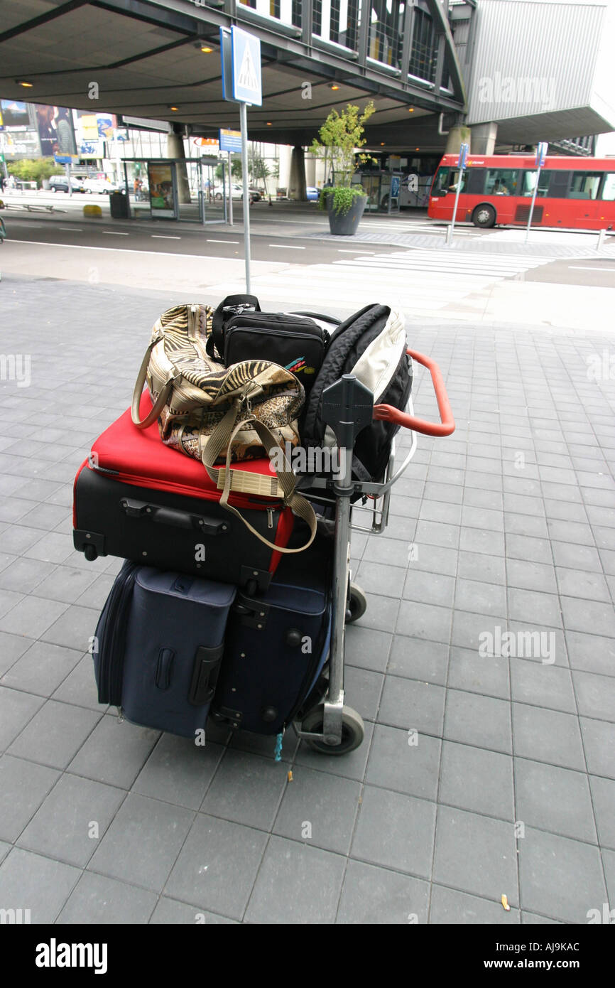 airport luggage trolley at arrivals Stock Photo Alamy