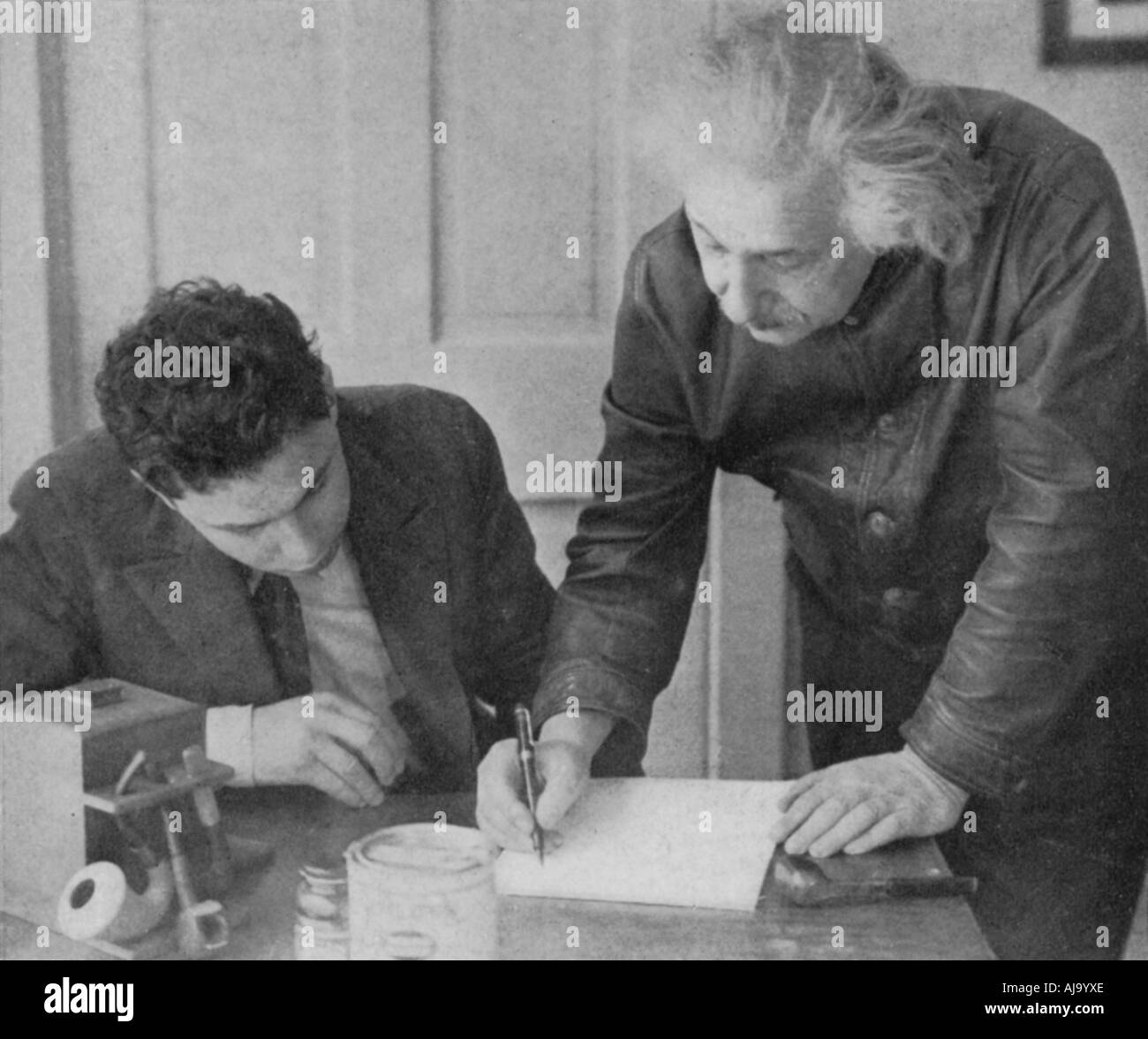 Albert Einstein, German-Swiss-American mathematician and physicist, with a student. Artist: Unknown Stock Photo