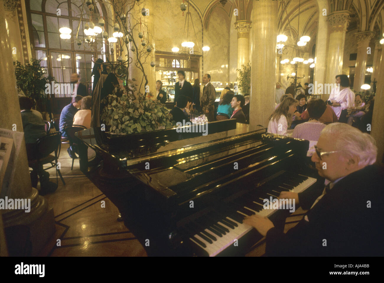pianist on a grand piano Cafe Central Vienna Wien Austria Oesterreich