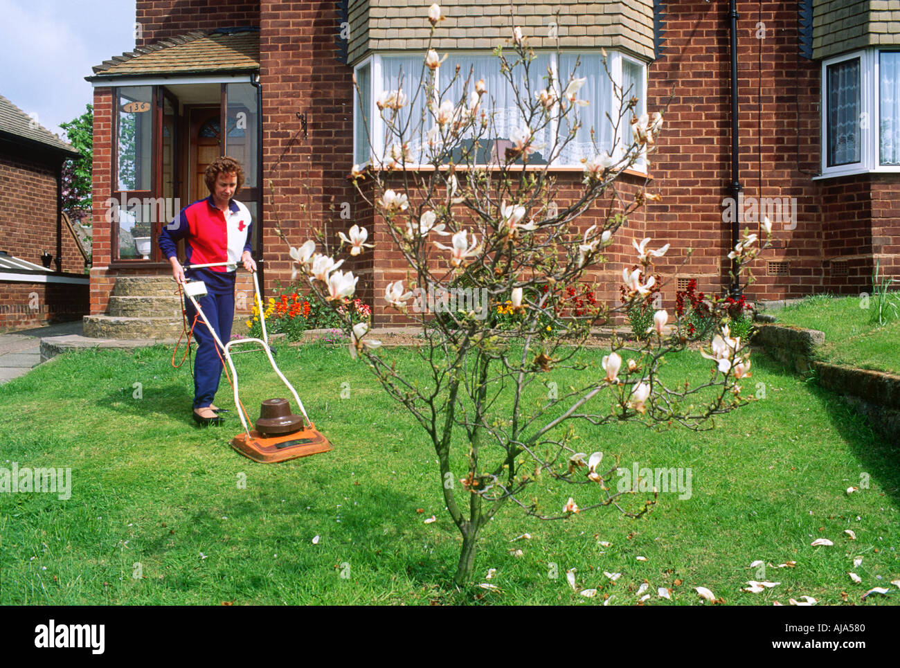UK England Mowing the lawn SB Stock Photo