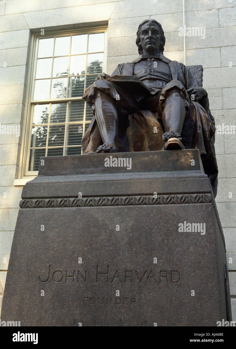 The statue of John Harvard in Harvard University Cambridge Massachusetts Stock Photo