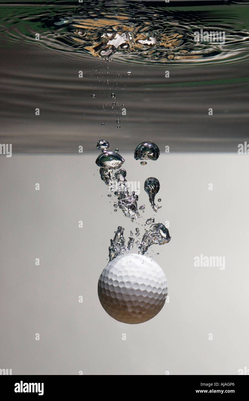 golf ball falling into water Stock Photo Alamy
