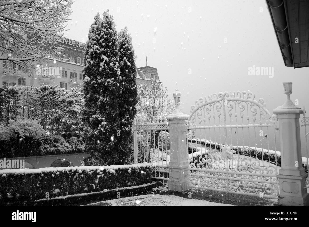 Snowy winter scene with wroght iron gates in pictures, Zell Am See ski resort, Austria. Stock Photo