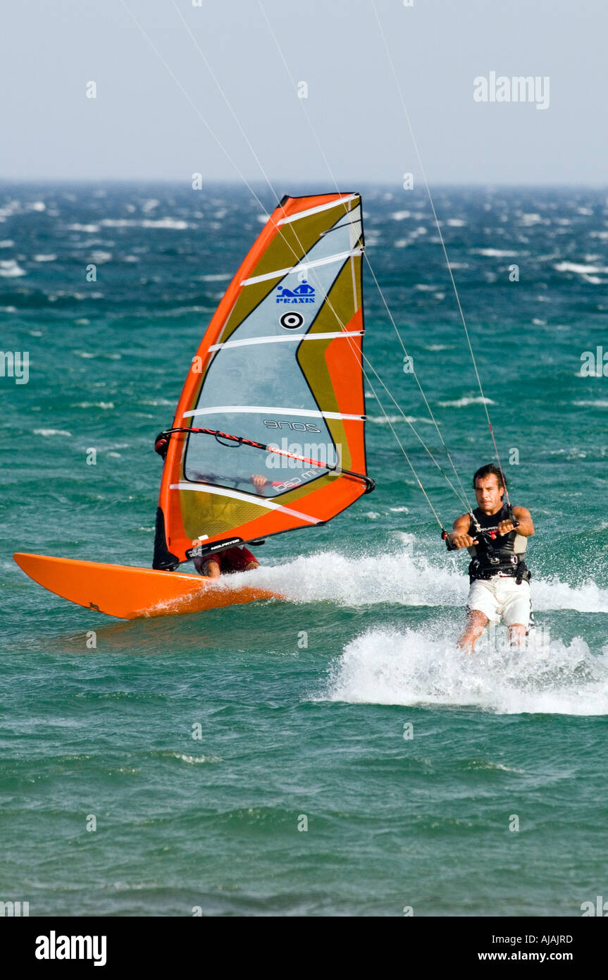 kitesurfing vs windsurfing Stock Photo Alamy
