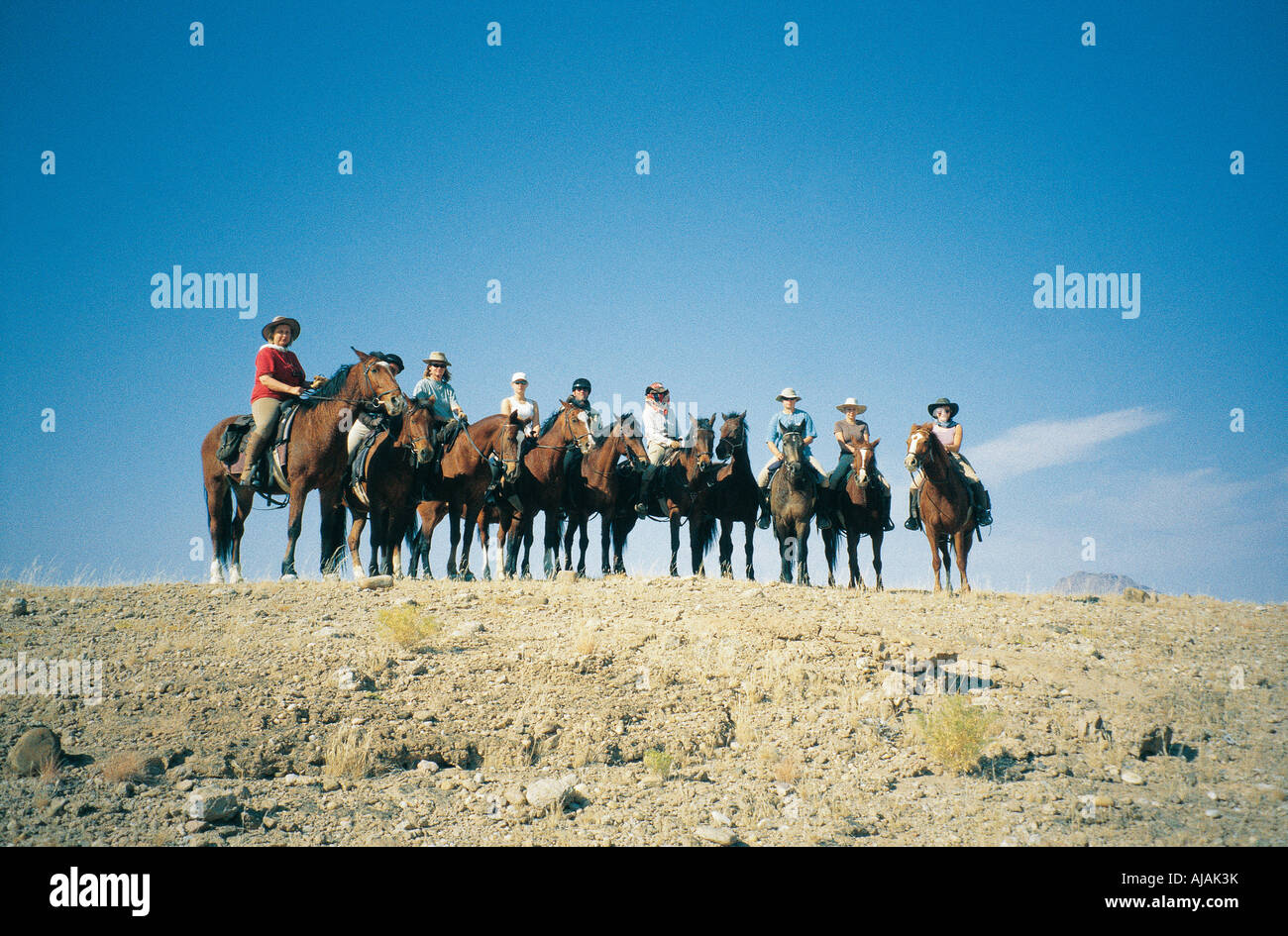 Mt Riders Background Line horses riders standing hi-res stock photography and images - Alamy