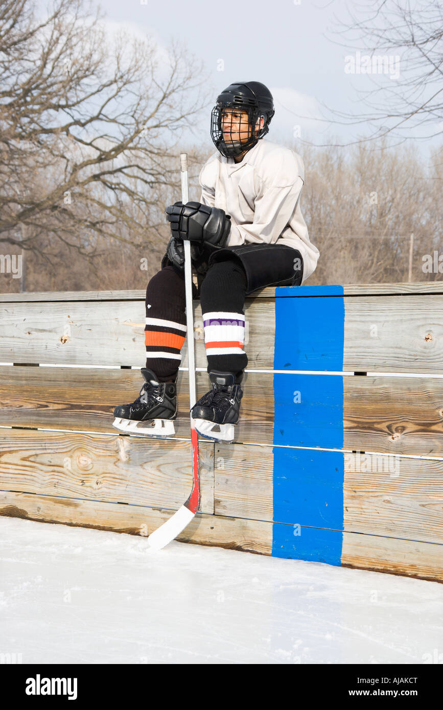 One boy holding hockey stick hires stock photography and images Alamy