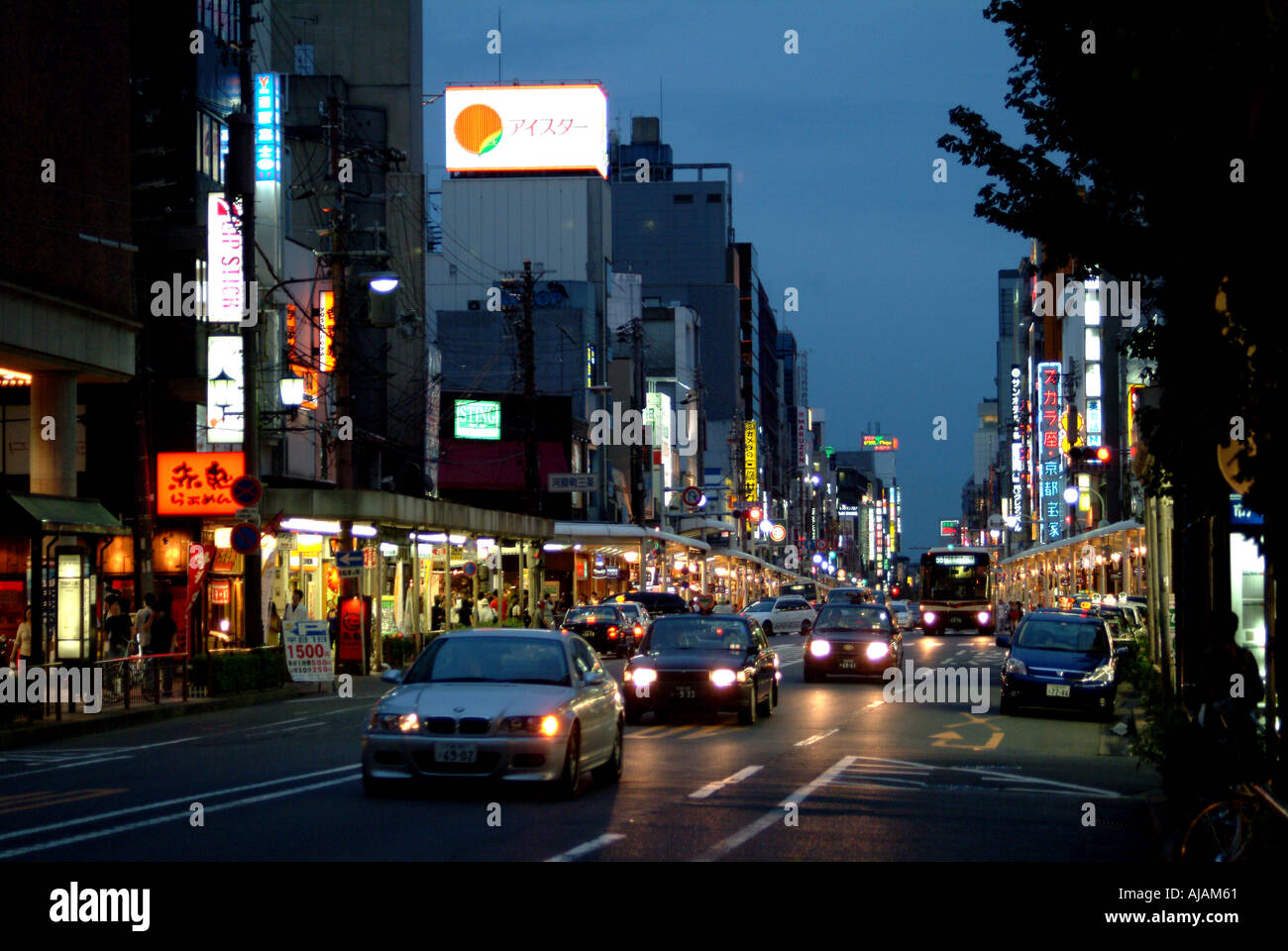 Kawaramachi street traffic at dusk Kyoto Japan Stock Photo