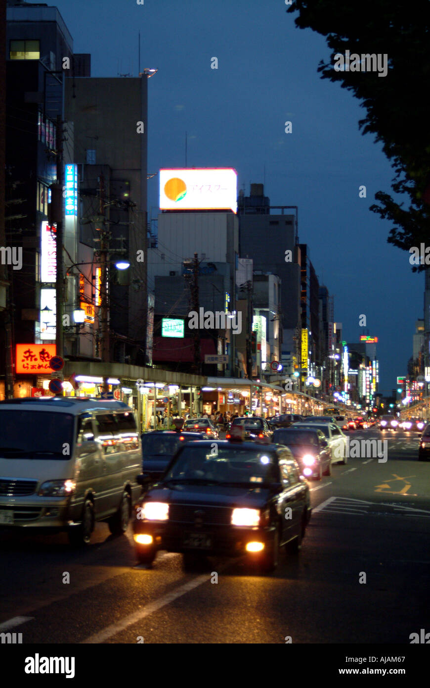 Kawaramachi street traffic at dusk Kyoto Japan Stock Photo