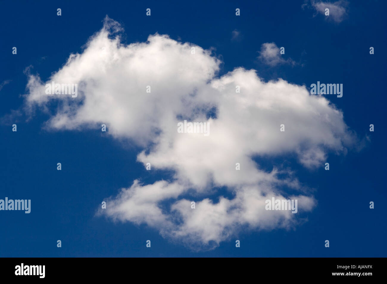 White clouds against a blue sky Stock Photo - Alamy
