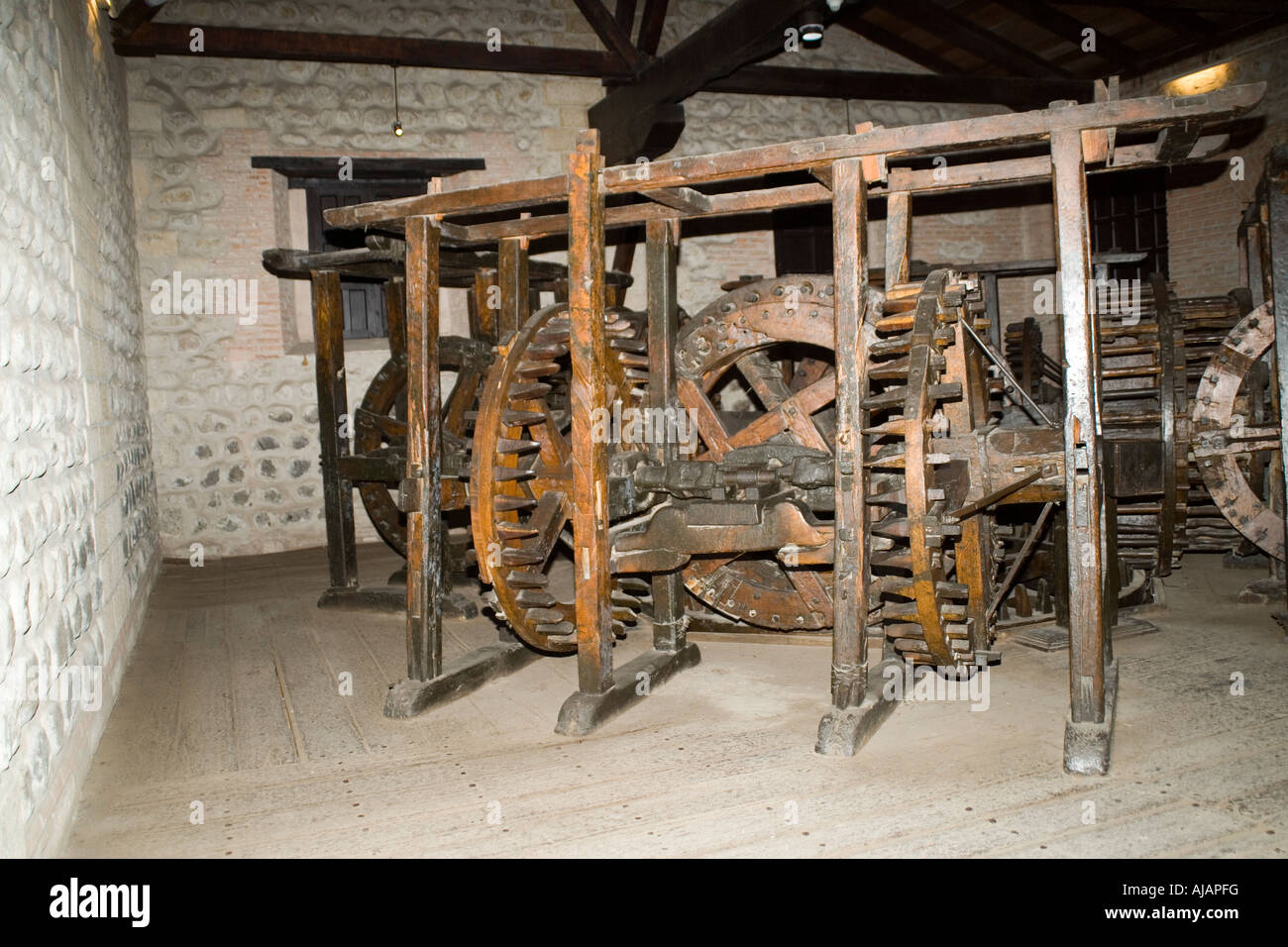 The Casa Real de la Moneda museum and an old coin stamping machine, the