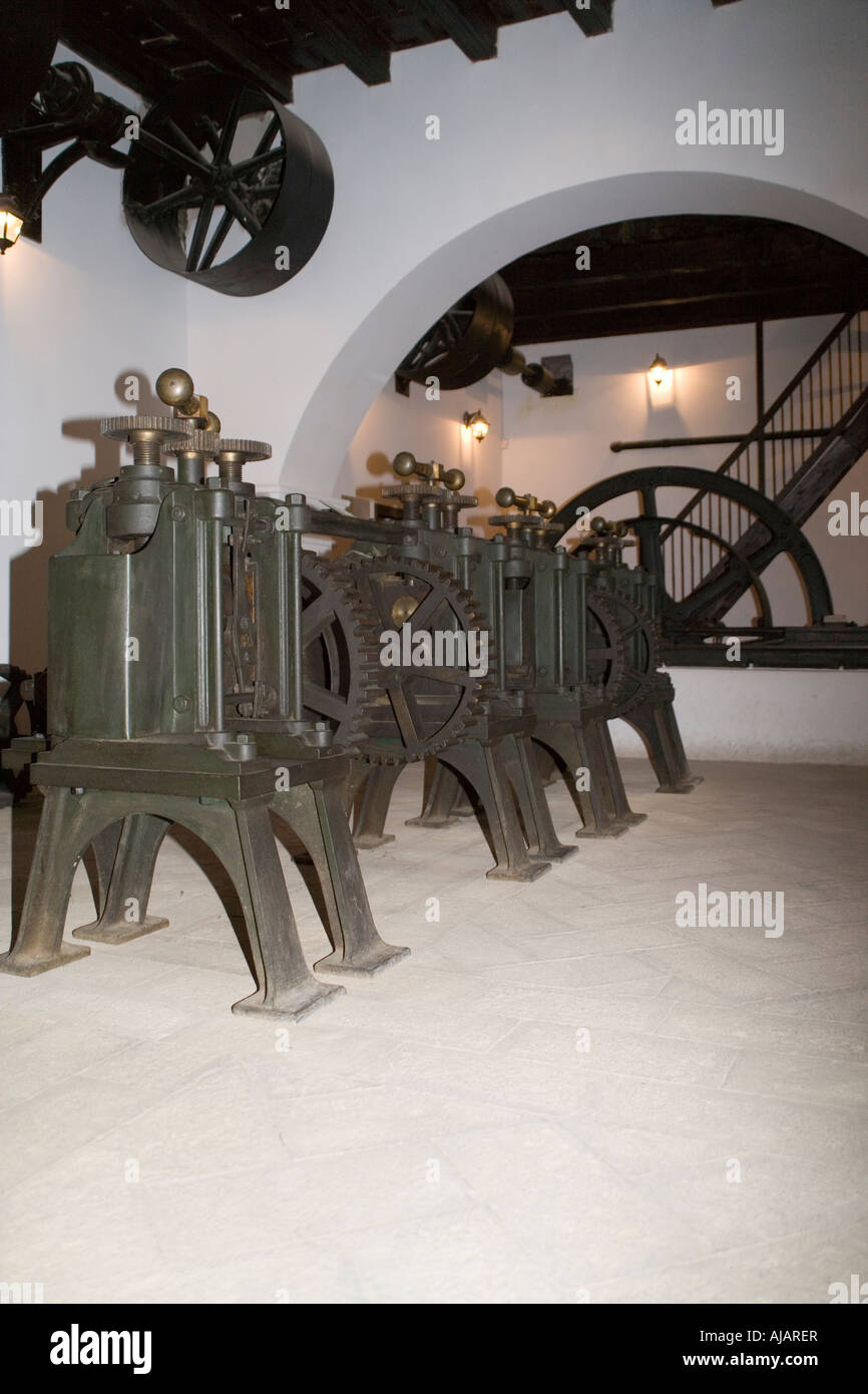 The Casa Real de la Moneda museum and an old coin stamping machine, the ...