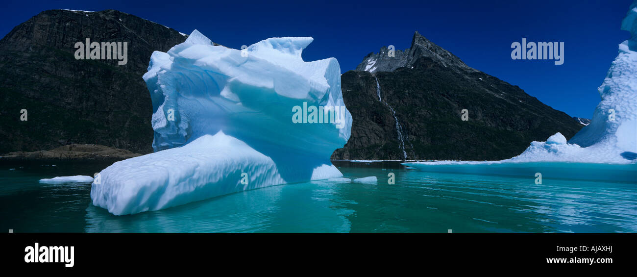 Greenland Aappilattoq Steep mountains line fjords along southern coastline on summer morning Stock Photo