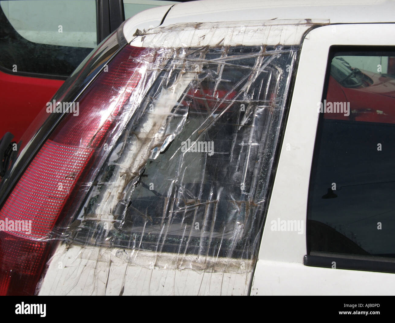 car side window repaired with adhesive tape Stock Photo - Alamy