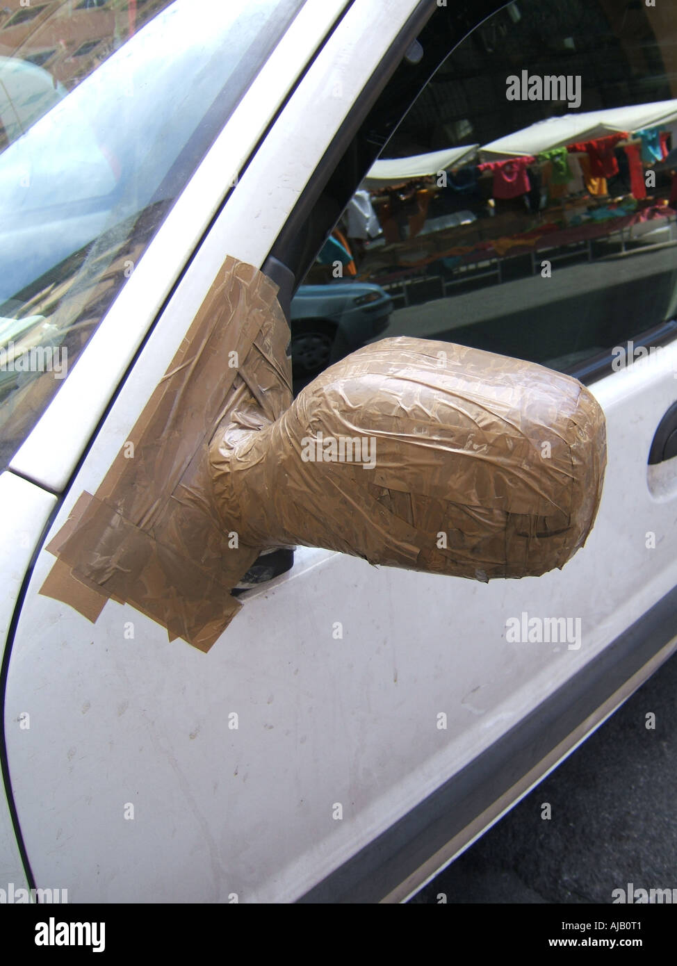 car side mirror repaired with adhesive tape Stock Photo Alamy