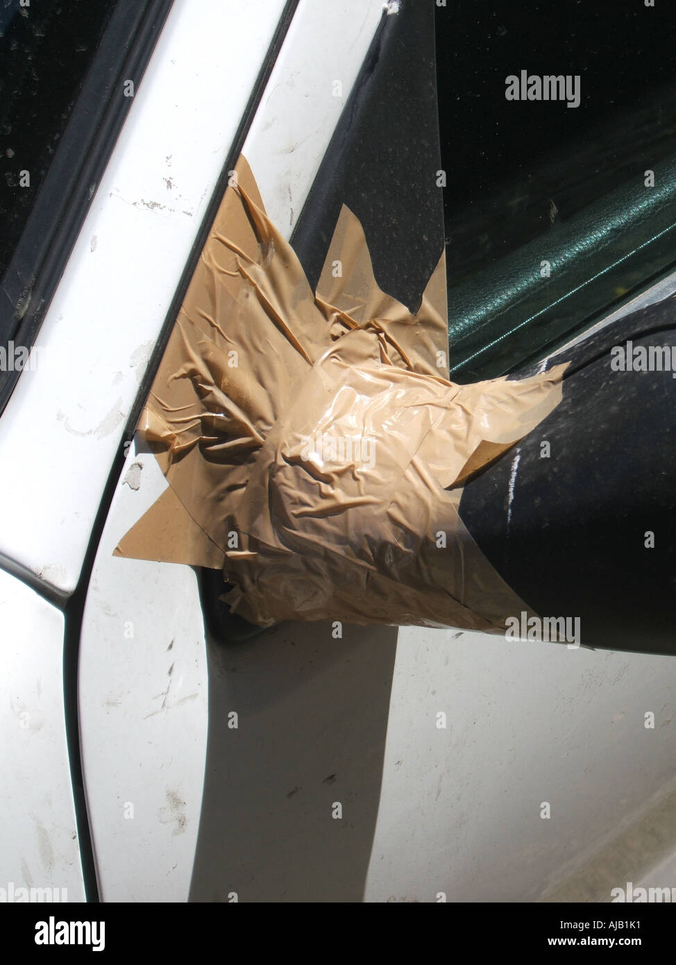car side mirror repaired with adhesive tape Stock Photo Alamy
