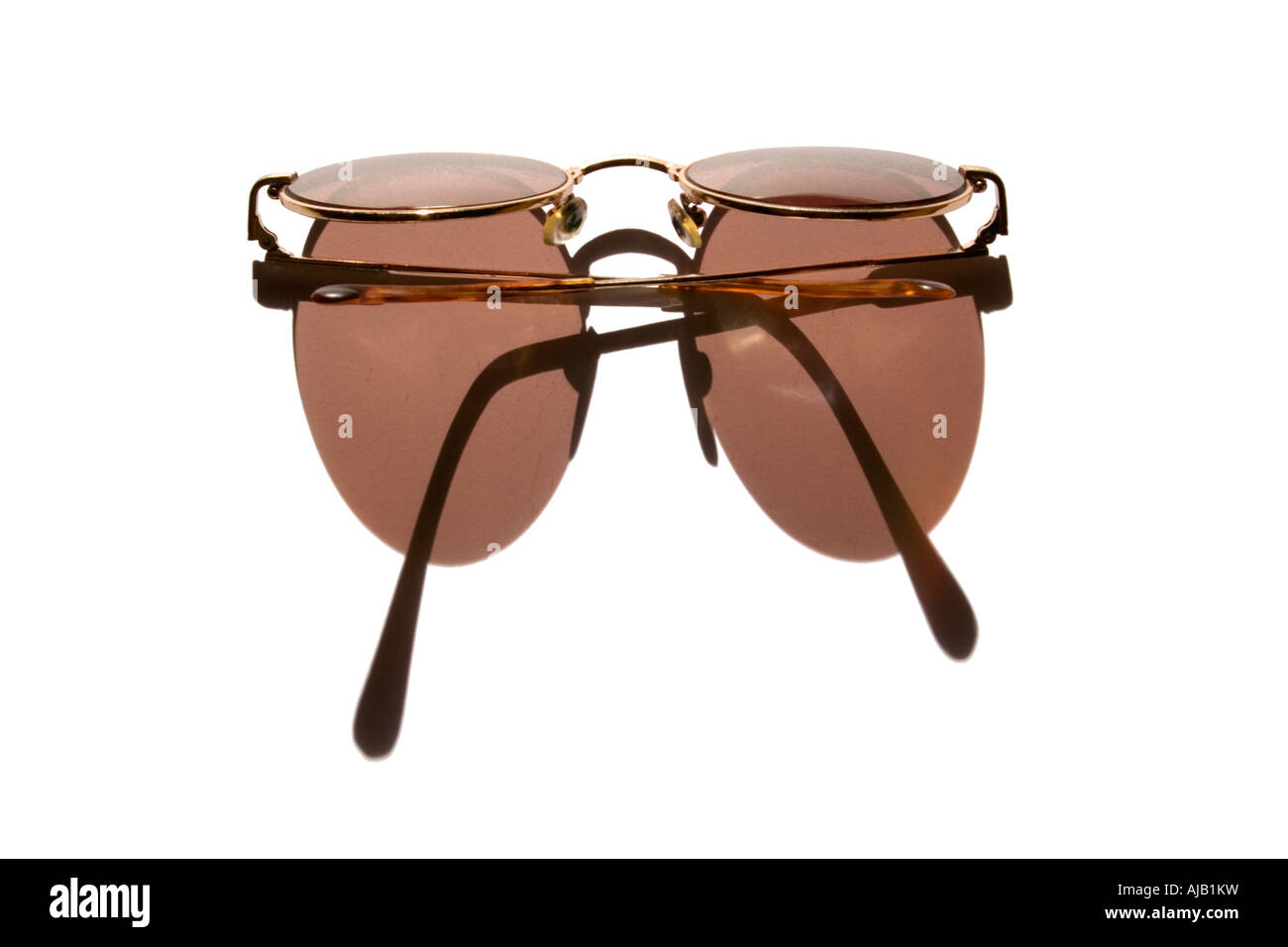 Sunglasses casting a shadow on a white background Stock Photo