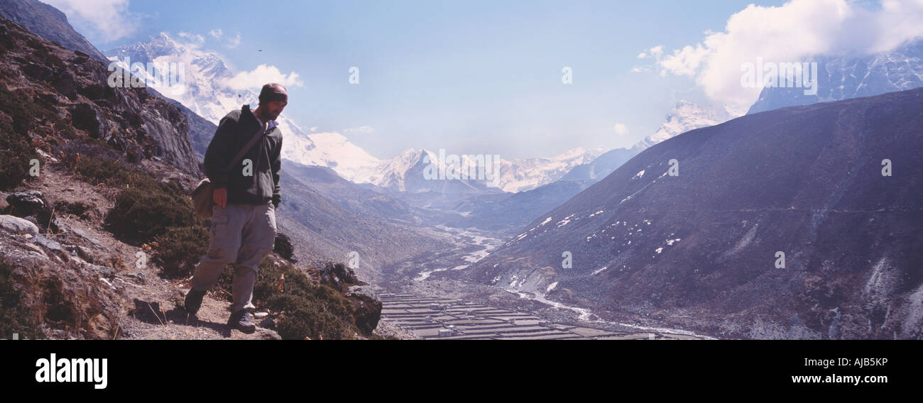 Man Trekking Through Himalayas Nepal Stock Photo Alamy Man Trekking Through Himalayas Nepal Stock Photo Alamy