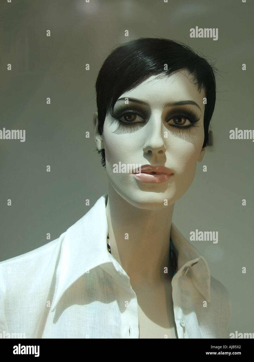 trendy female mannequin in shop window Stock Photo - Alamy