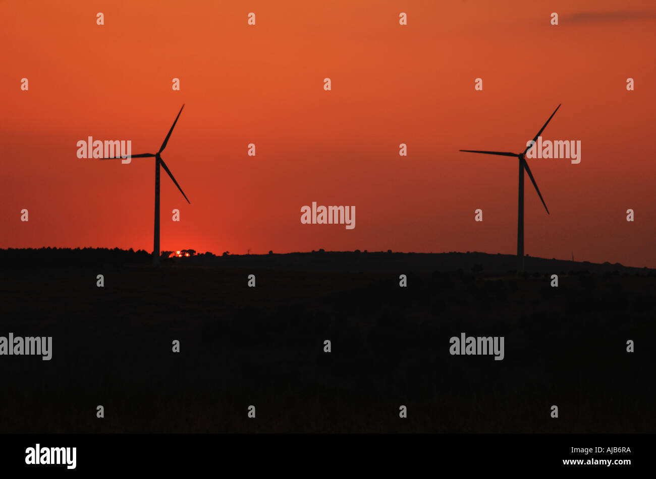 Electric Generator Wind turbine at sunset Stock Photo Alamy