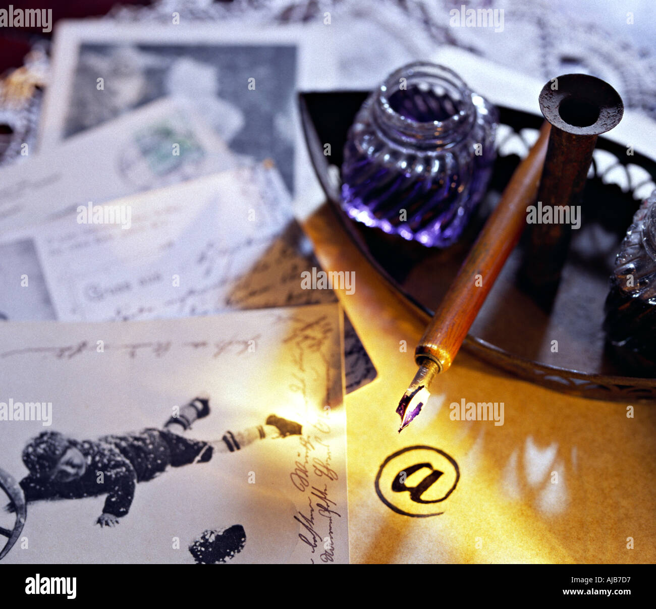sign with old post cards and nib and ink pots Stock Photo - Alamy
