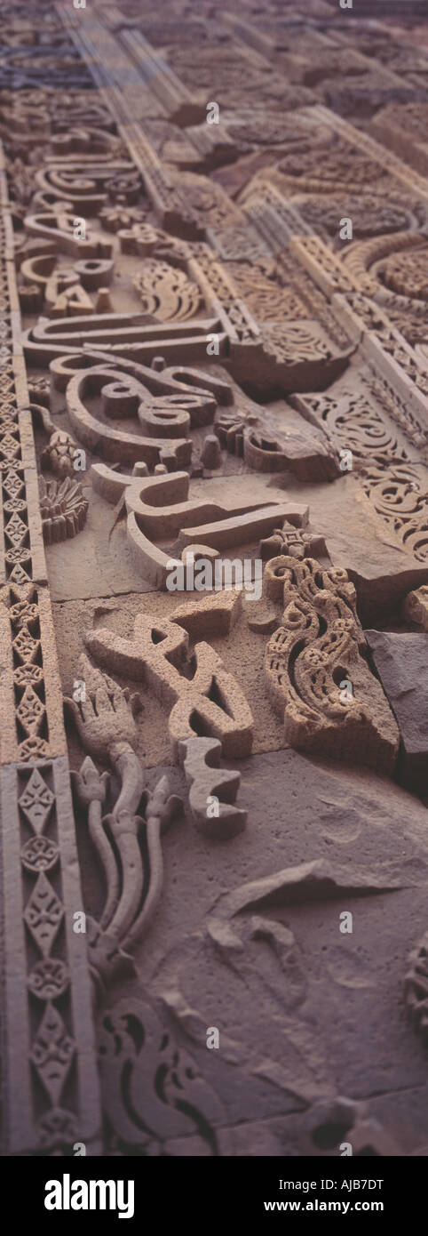 Stone Carving Script stone carving script, Qubut Minar, Delhi, India Stock Photo - Alamy