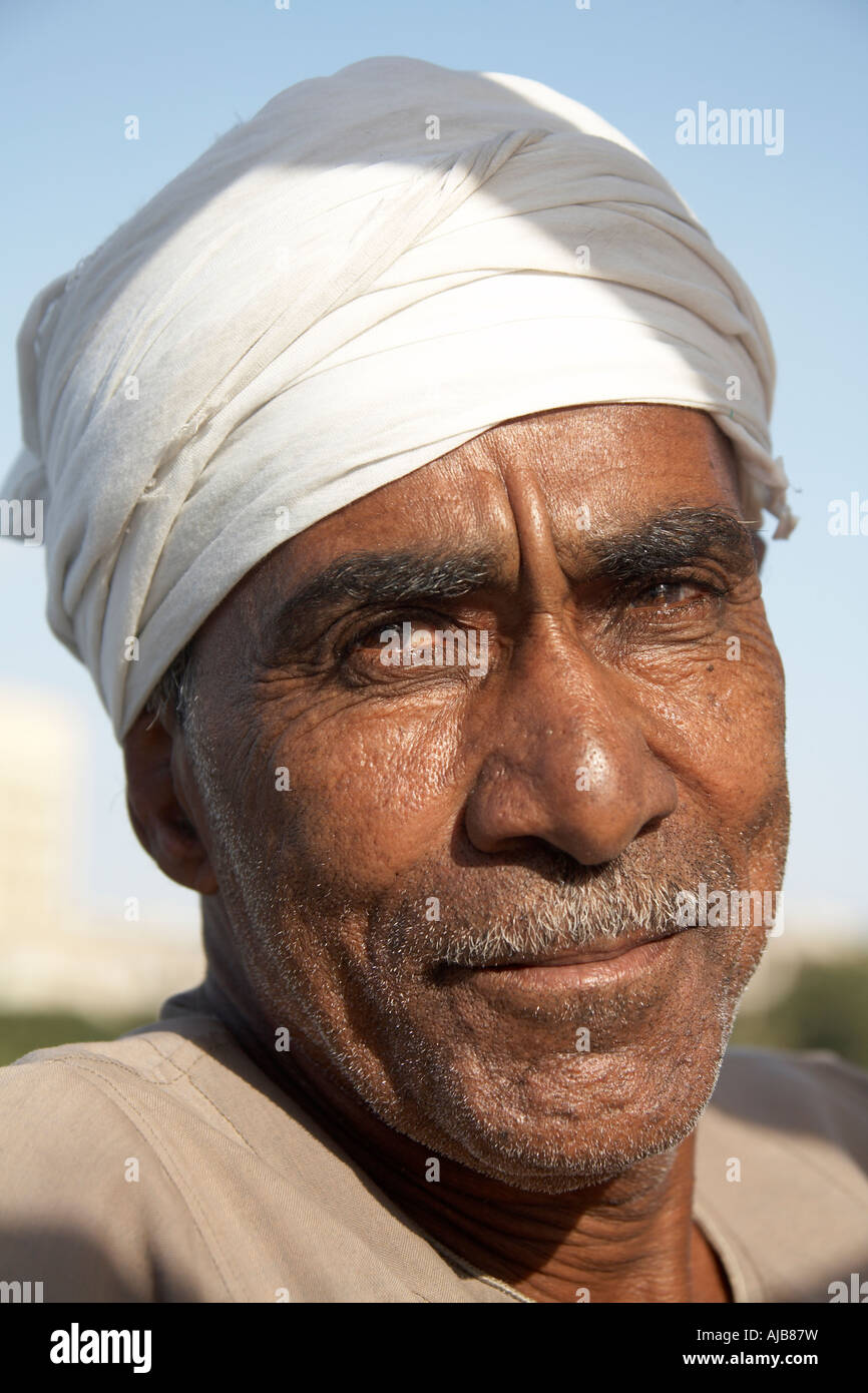 Egyptian boat man in traditional galibeya robe and turban Cairo Egypt