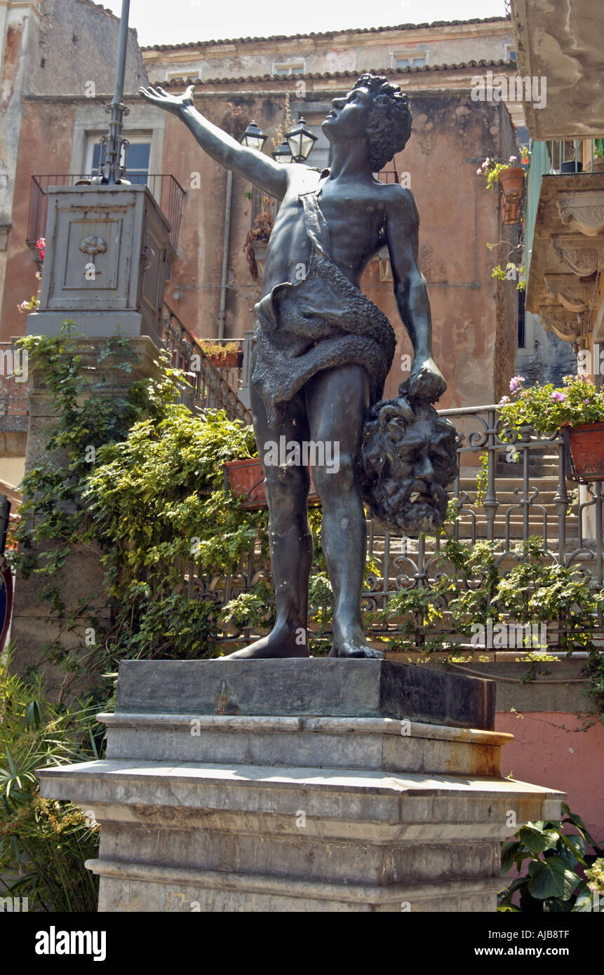 Bronze statue of young David holding Goliath s head Stock Photo Alamy