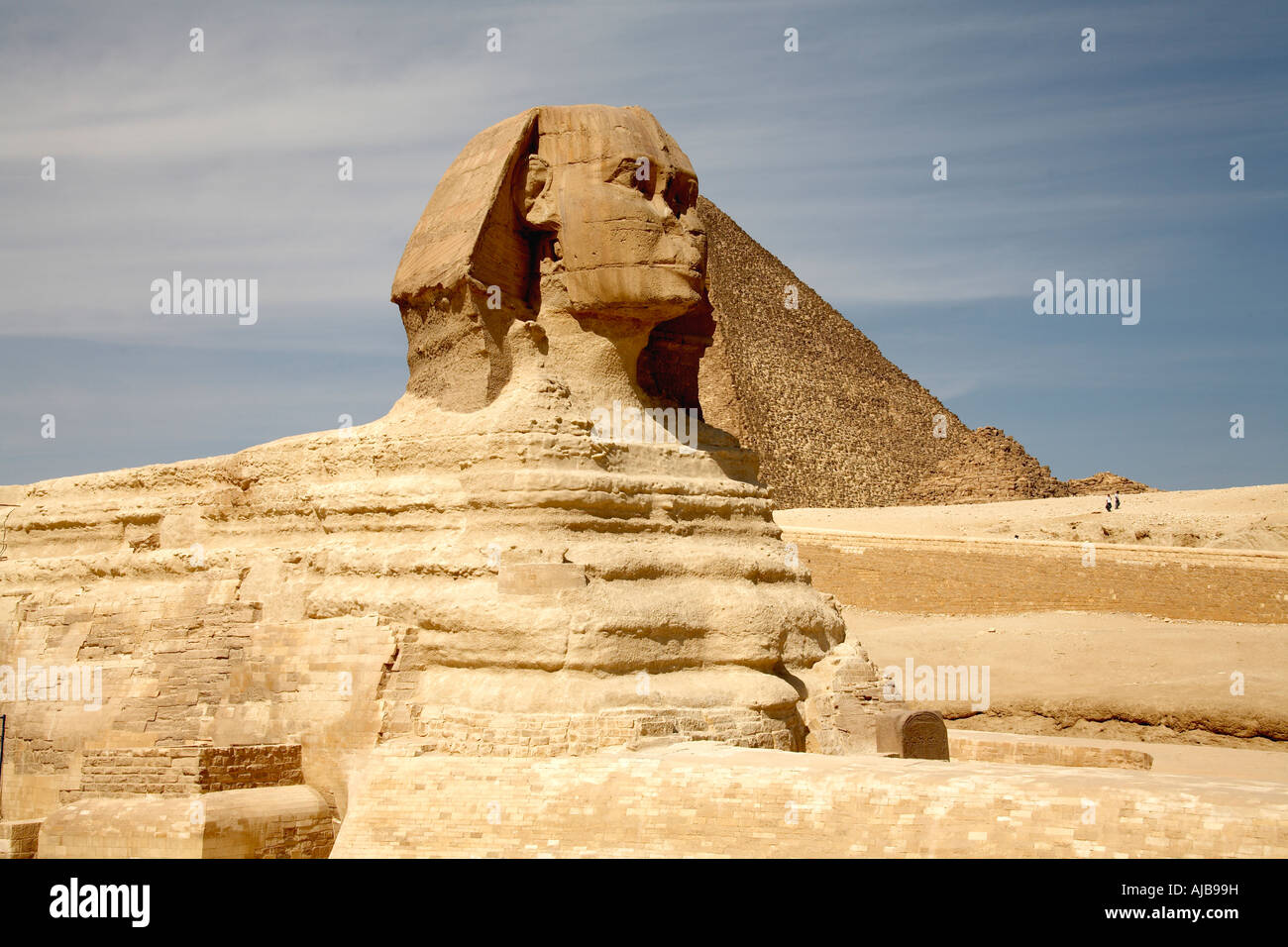 The Sphinx with Great Pyramid of Khufu Cheops in distance Giza Cairo ...
