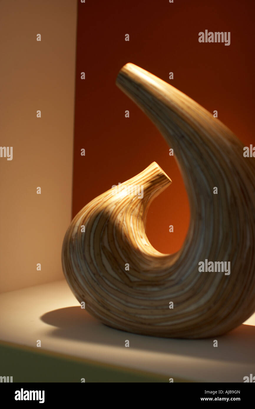 Curved wooden smooth sculpture art form Stock Photo